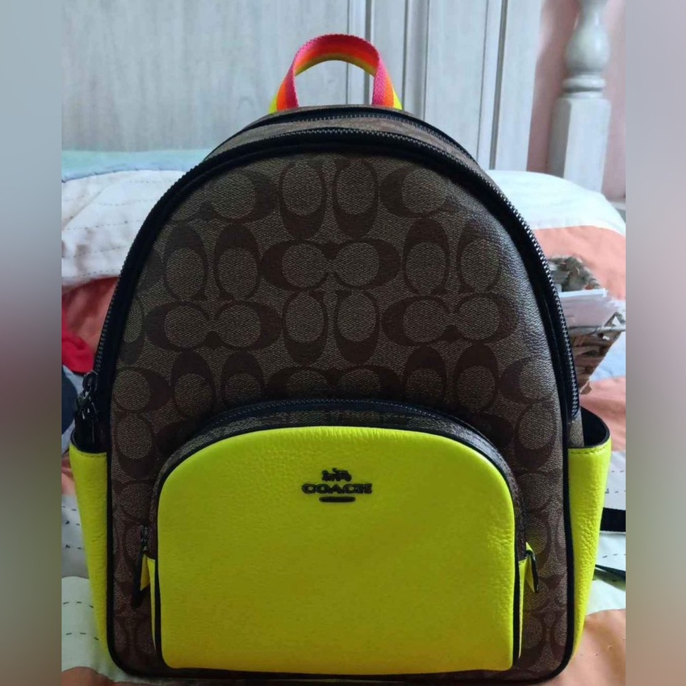 Use like new coach gorgeous backpack measuring 12" x 12"